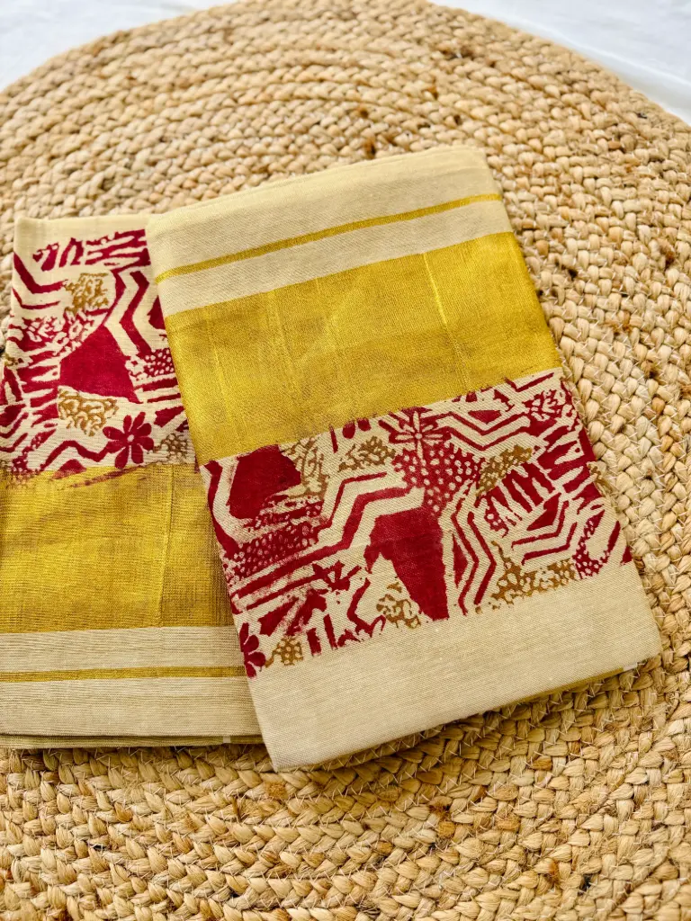 SM013 - Maroon Tissue Kerala Set Munde
